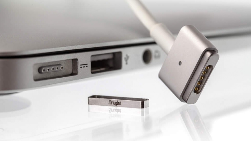 Illustration for article titled A Simple Metal Ring Keeps Your MagSafe In Line
